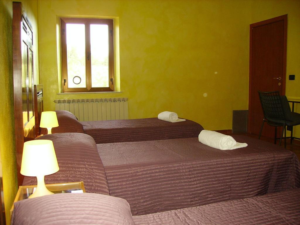 La Voliera Bed & Breakfast Пиза Стая снимка